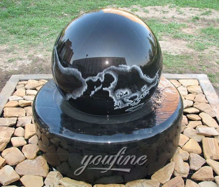 Outdoor black granite stone fengshui ball water fountains with wold map designs at the entrance of the comercial banks