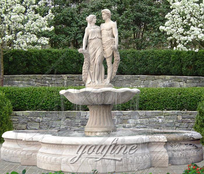 Outdoor large marble water features with young lovers hold flowers for yard