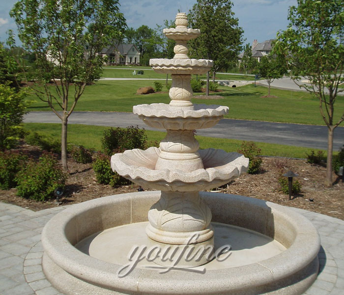 Four tiers casting marble water features in the side of the road outdoor